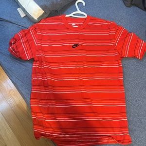 Red Nike tee